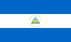 The national flag of Nicaragua, a horizontal triband of azure (top and bottom) and white with the National Coat of Arms centered on the white band.