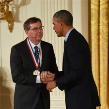 Arthur Levinson shakes hands with President Barack Obama