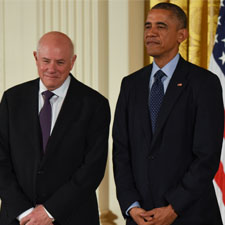 Eli Harari poses with President Barack Obama