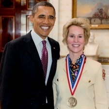 Frances A. Arnold poses with President Barack Obama