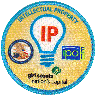 Image of the I P patch featuring a lightbulb, and the Girl Scouts, U S P T O and I P O logos