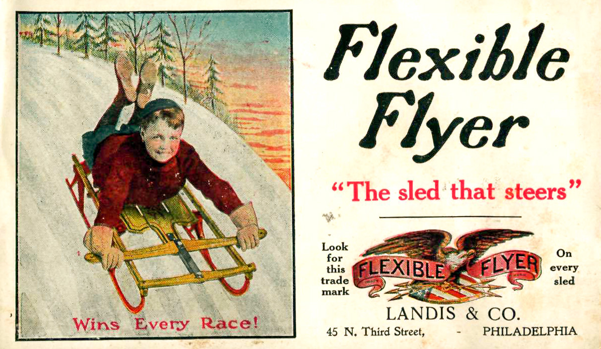 Color advertisement for the Flexible Flyer, “The sled that steers,” with an image of a boy sledding downhill, the caption reading, “Wins Every Race!”
