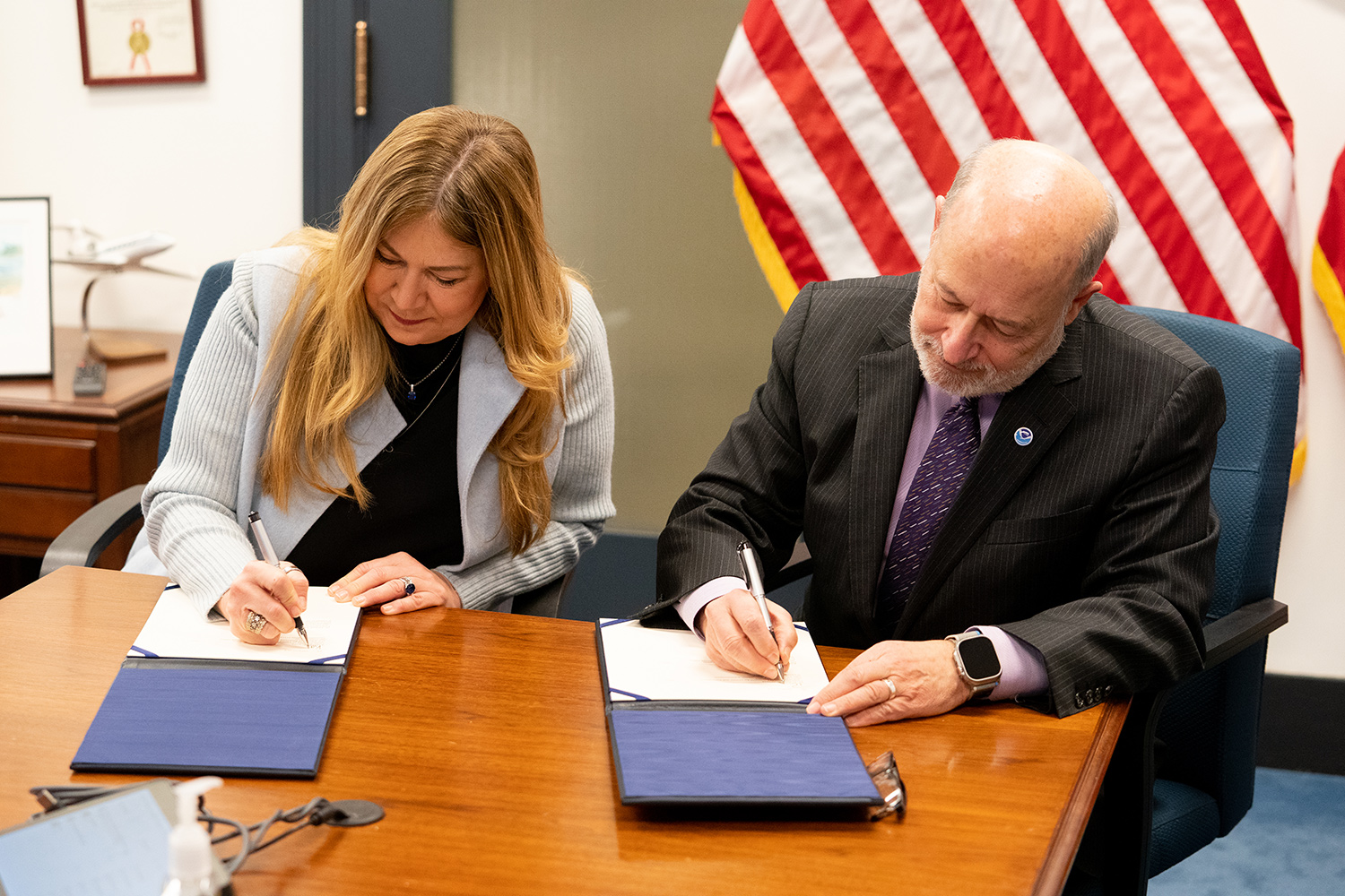 Kathi Vidal, Under Secretary of Commerce for Intellectual Property and Director of the United States Patent and Trademark Office (USPTO) and Richard W. Spinrad, Ph.D., Under Secretary of Commerce for Oceans and Atmosphere and NOAA Administrator sign a memorandum of understanding (MOU) to advance climate technology.