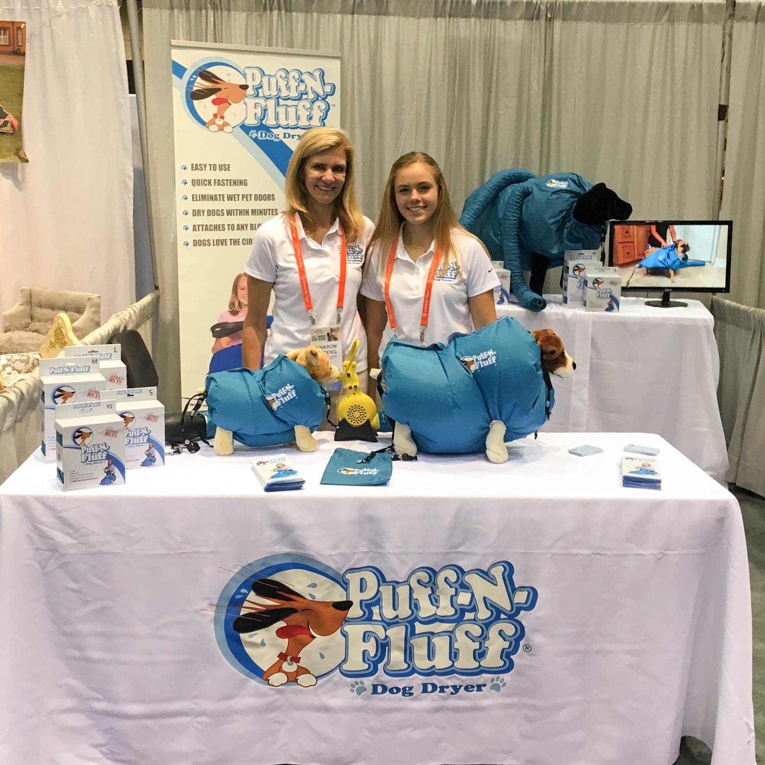 Marissa Streng and her mother are surrounded by promotional materials and demonstrations of the Puff-N-Fluff.