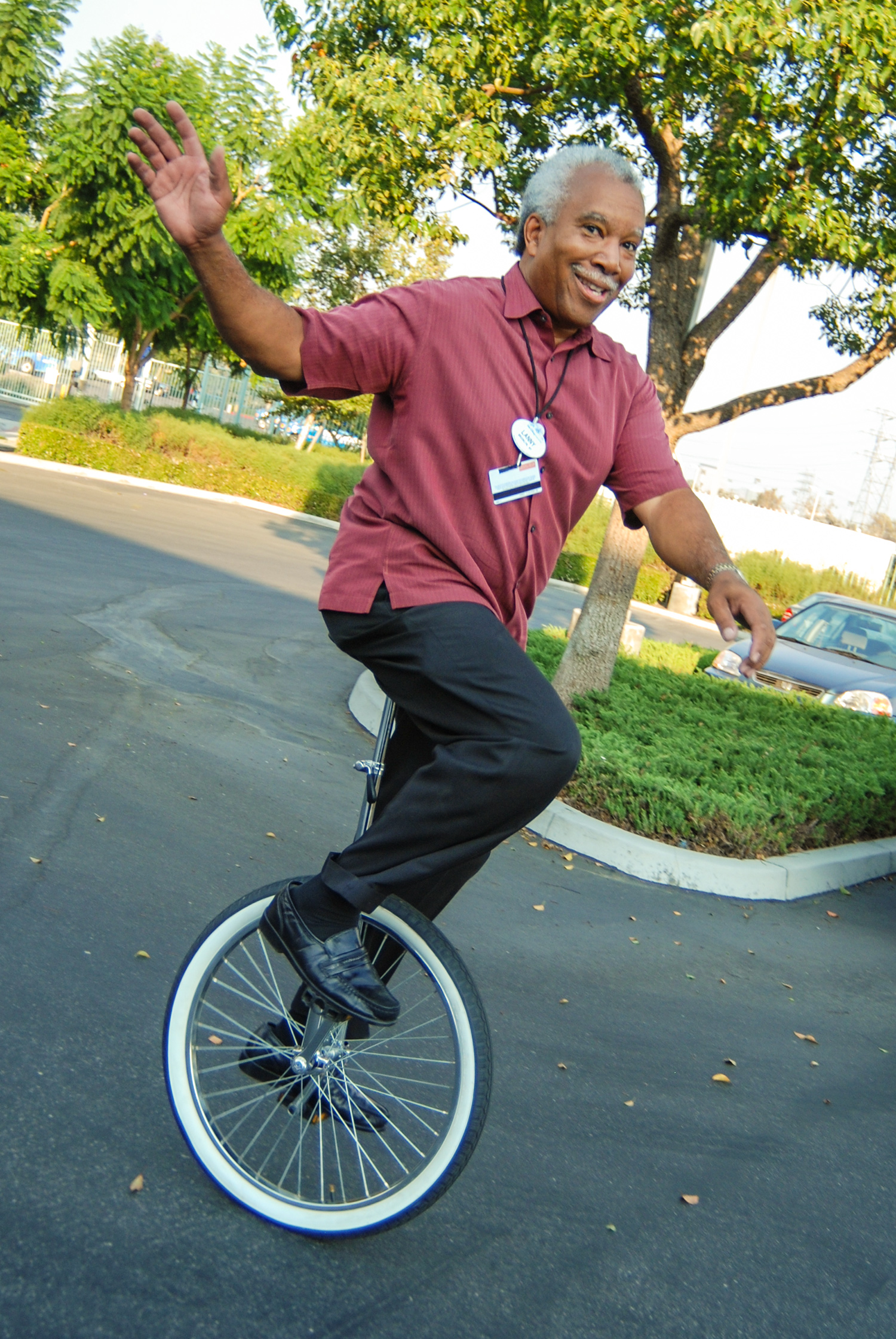 Lanny Smoot riding a unicycle