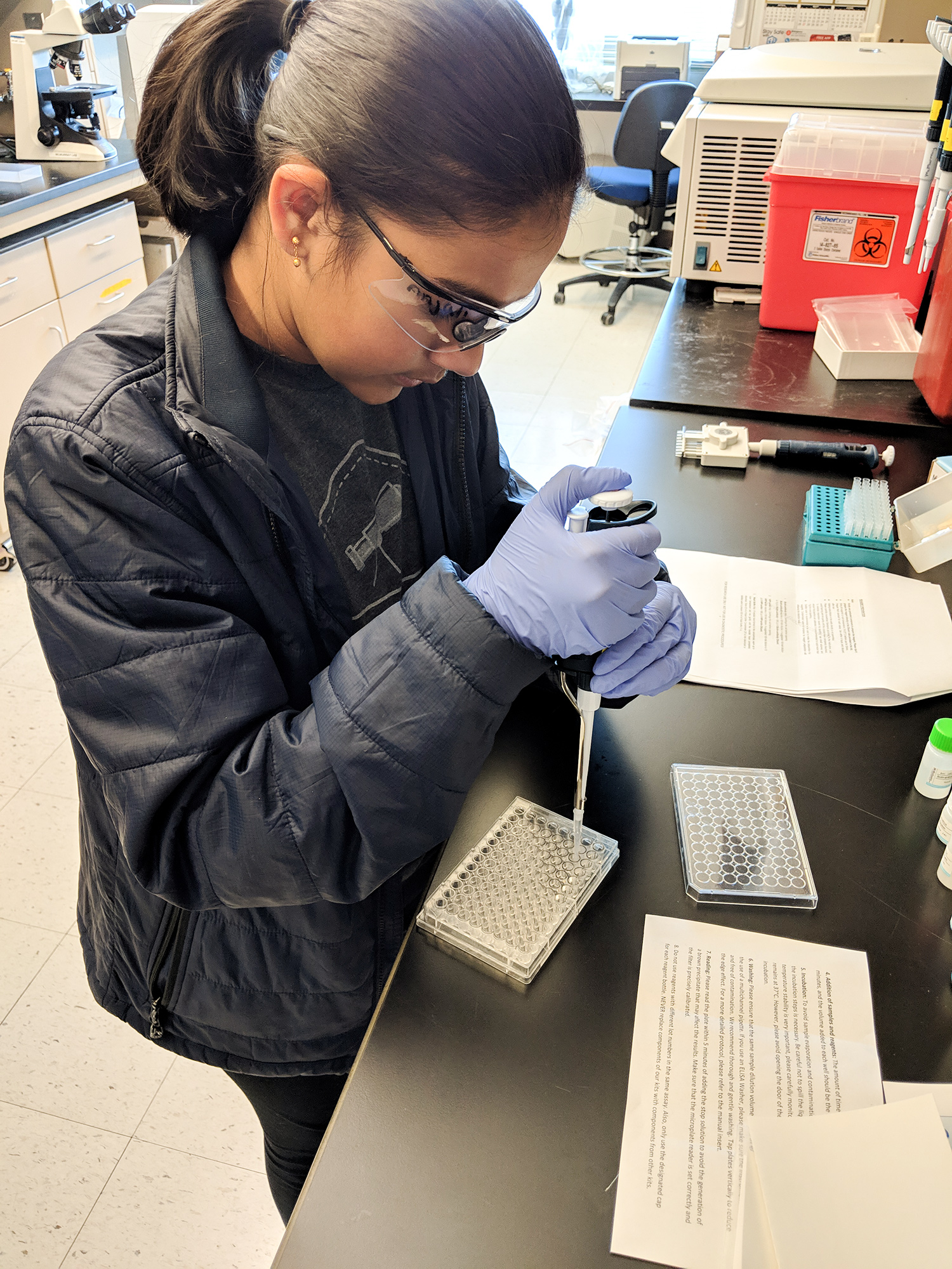 Gitanjali Rao pipetting while working in Dr. McMurray’s lab