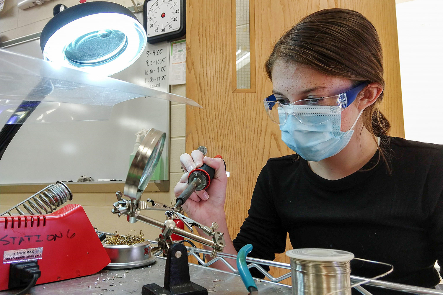 Doug’s student soldering.