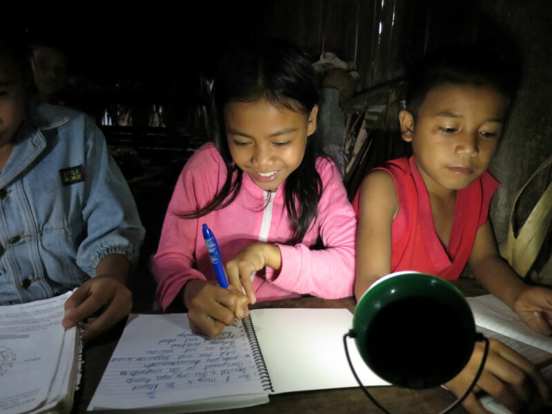 Image: Children studying in the Philippines using Nokero solar light