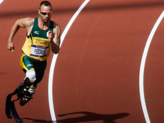 Oscar Pistorius, running with his special carbon fiber "blade" prosthetics