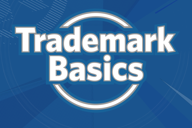 white Trademark Basics letters on a blue background