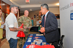 USPTO staff Alford Kindred and Harry Kim share entrepreneurship resources with military personnel and spouses at Hanscom Air Force Base (Photo courtesy of Todd Maki, Hanscom Air Force Base)