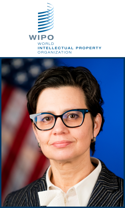 Marina Lamm in front of a US flag with the World Intellectual Property Organization logo placed above the portrait