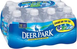 Deer Park specimen shows trademark use for drinking water. The specimen is a photograph of a 12-pack of water. The trademark is shown prominently on the plastic packaging. 