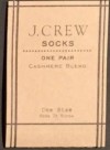 logo of J. Crew socks, one pair cashmere blend text with tan background