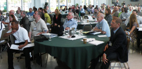 Inventors Eye Independent Inventors Conferences: A Look Inside Attendees at one of the USPTO's regional Independent Inventors Conferences gathered together at a table